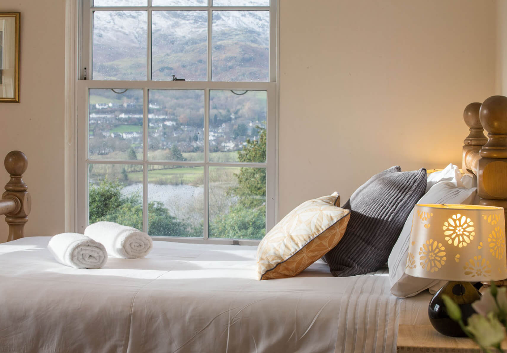 view through window at retreat, welcome bedroom in foreground