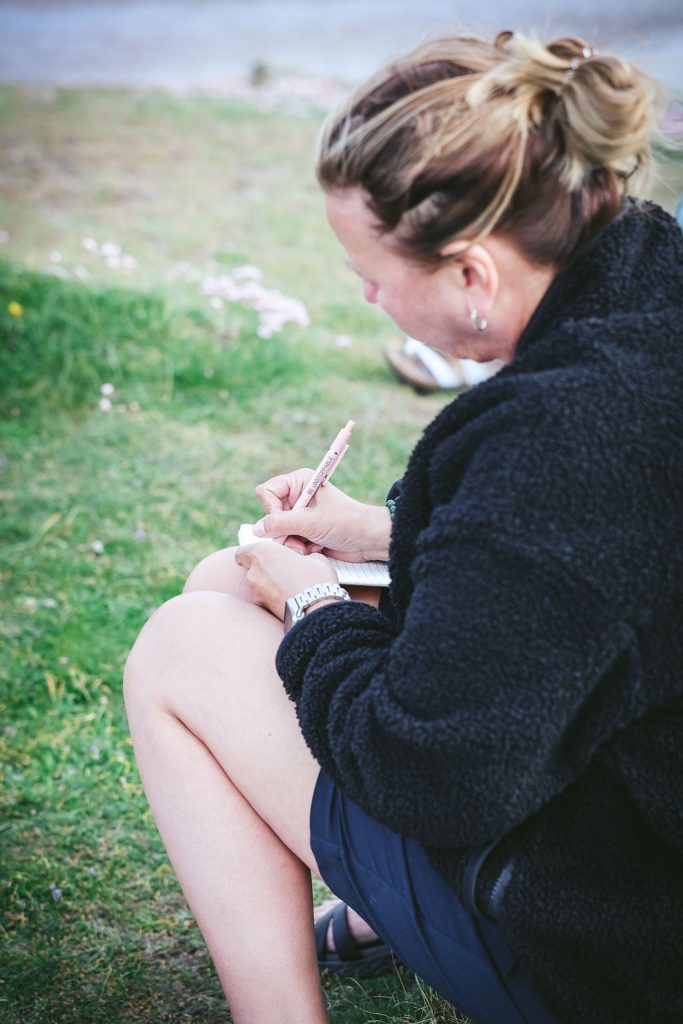 retreat woman sat outside
